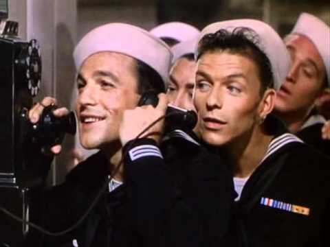 Gene Kelly (flanked by Frank Sinatra)