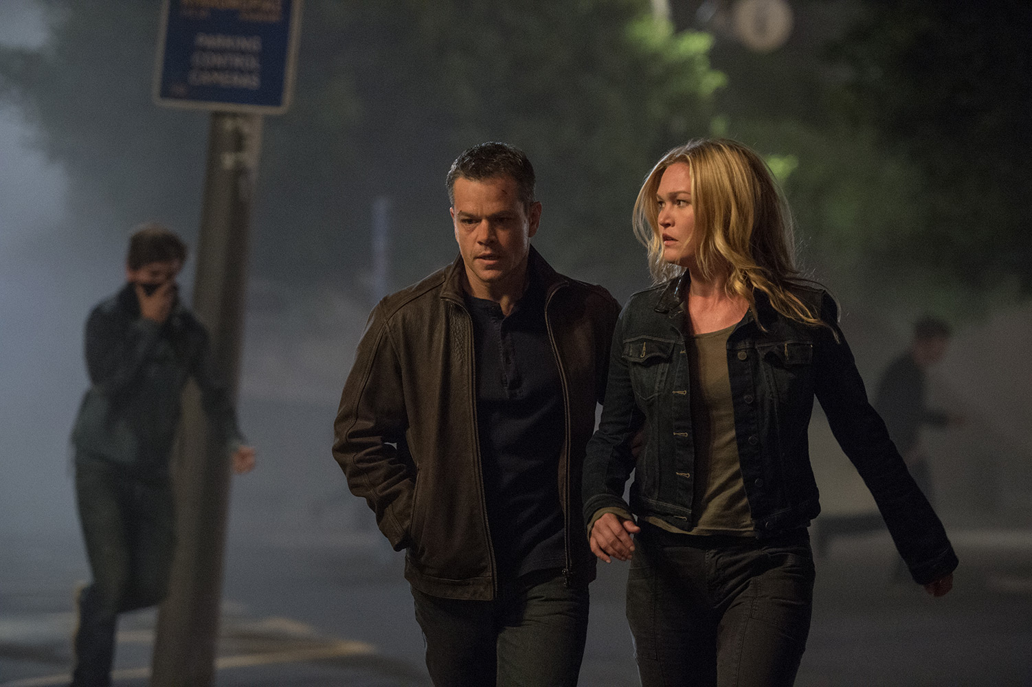 Matt Damon and Julia Stiles walk the streets of Athens in Jason Bourne (2016)