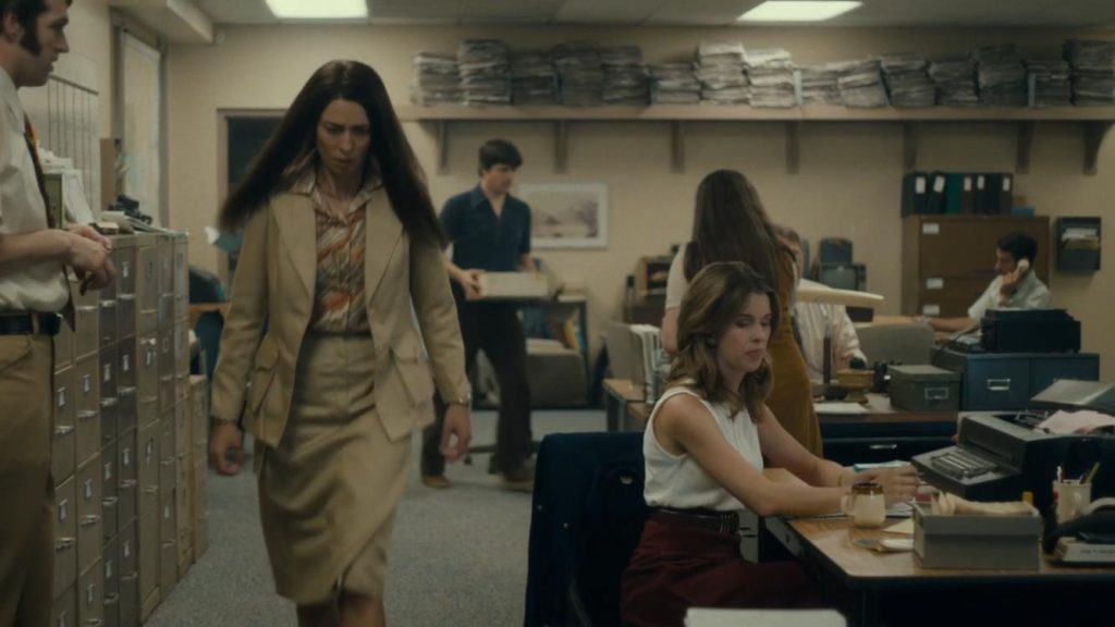 Rebecca Hall as Christine, storming through the newsroom.