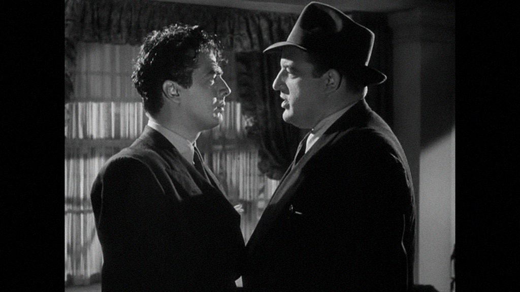 Victor Mature can't shake Laird Cregar.