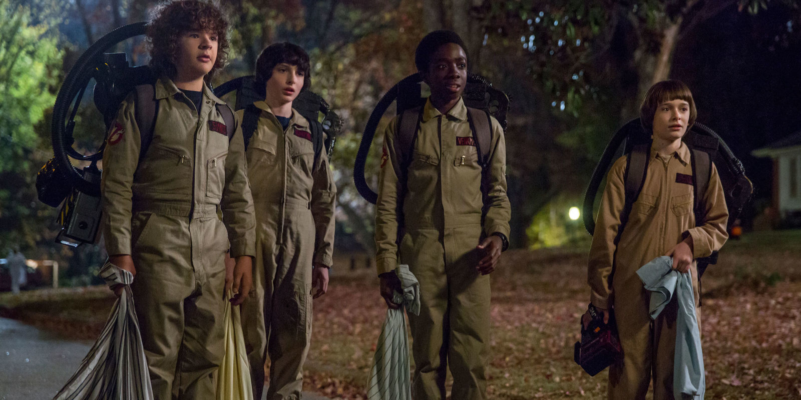 Gaten Matarazzo as Dustin, Finn Wolfhard as Mike, Caleb McLaughlin as Lucas, and Noah Schnapp as Will Byers dressed as Ghostbusters in STRANGER THINGS 2 (2017)