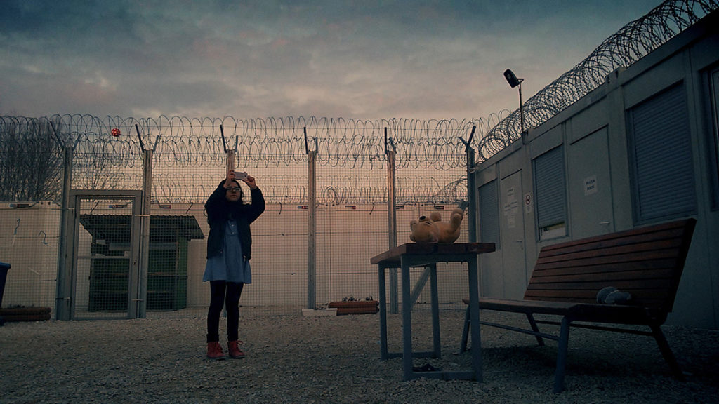 In a detention center in MIDNIGHT TRAVELER (2019). 