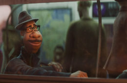 Joe Gardner (voiced by Jamie Foxx) rides a subway in SOUL (2020)