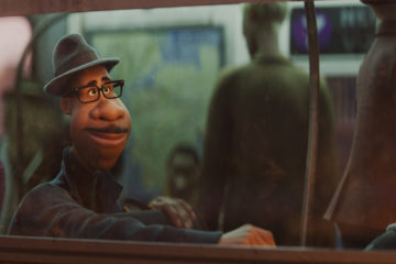 Joe Gardner (voiced by Jamie Foxx) rides a subway in SOUL (2020)