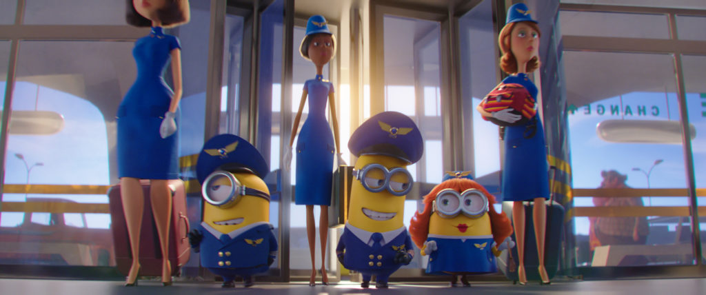 Kevin, Stuart, and Bob disguise themselves as airline pilots and a flight attendant in MINIONS: THE RISE OF GRU