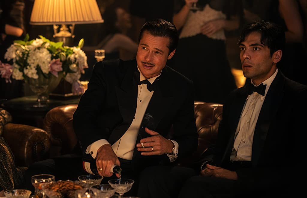 Brad Pitt and Diego Calva chat in BABYLON (2022)