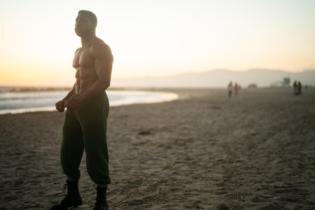 Jonathan Majors trains on the beach in CREED III (2023)