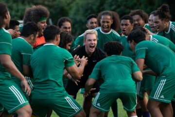 Michael Fassbender cheers with the team in NEXT GOAL WINS (2023)