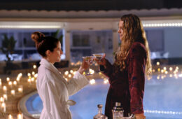 Anna Kendrick and Blake Lively clink martini glasses poolside in ANOTHER SIMPLE FAVOR (2025)
