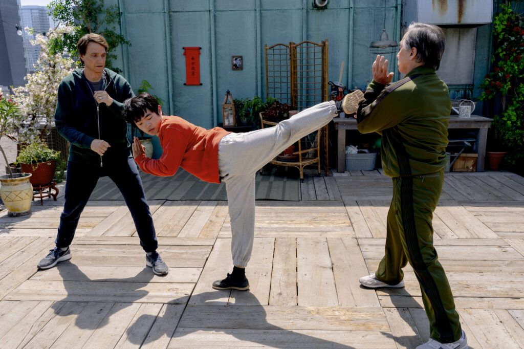 Ralph Macchio, Ben Wang, and Jackie Chan train in KARATE KID: LEGENDS (2025)