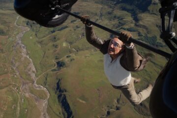 Tom Cruise hangs from a plane in MISSION: IMPOSSIBLE - THE FINAL RECKONING (2025)