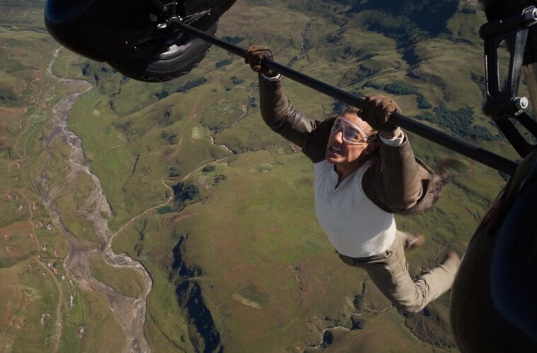 Tom Cruise hangs from a plane in MISSION: IMPOSSIBLE - THE FINAL RECKONING (2025)