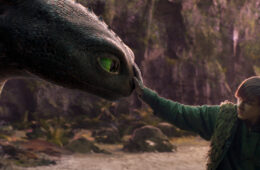 Mason Thames (right) as Hiccup with his Night Fury dragon, Toothless, in Universal Pictures’ live-action How to Train Your Dragon, written and directed by Dean DeBlois.