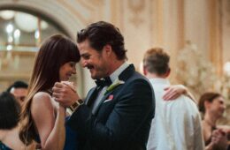 Dakota Johnson and Pedro Pascal dance at a wedding in MATERIALISTS (2025)