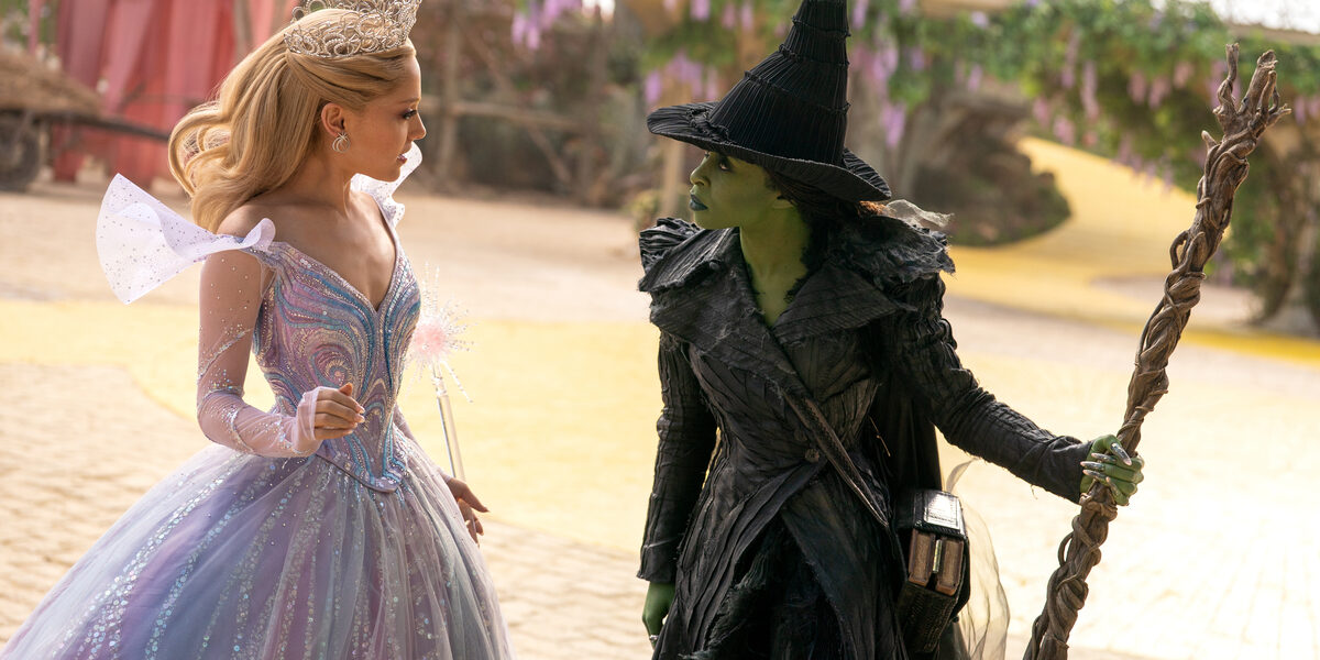 L to R: Ariana Grande is Glinda and Cynthia Erivo is Elphaba in WICKED FOR GOOD, directed by Jon M. Chu.