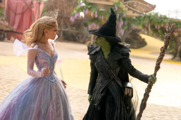 L to R: Ariana Grande is Glinda and Cynthia Erivo is Elphaba in WICKED FOR GOOD, directed by Jon M. Chu.