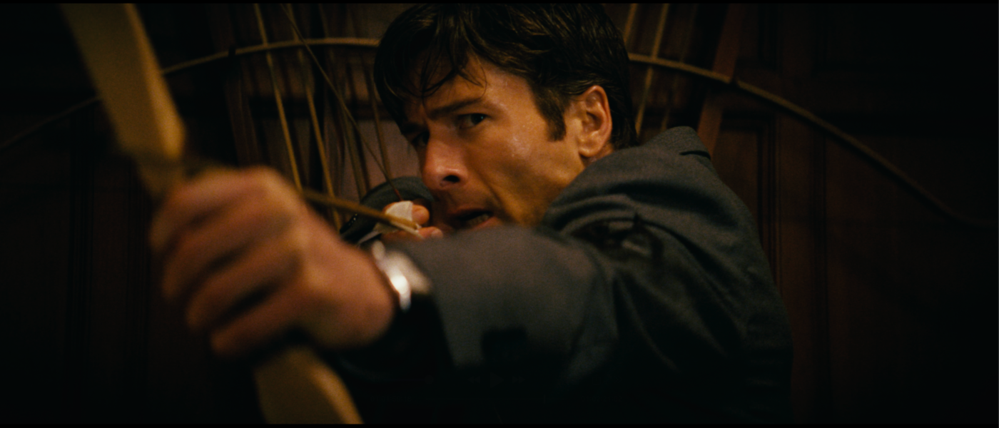 Glen Powell aims an arrow in HOW TO MAKE A KILLING (2026)