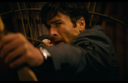 Glen Powell aims an arrow in HOW TO MAKE A KILLING (2026)