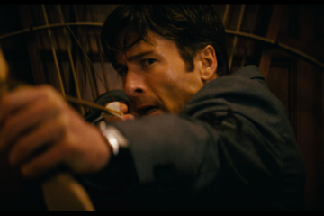 Glen Powell aims an arrow in HOW TO MAKE A KILLING (2026)