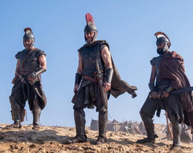 Center L to R: Jimmy Gonzales is Cepheus, Matt Damon is Odysseus and Himesh Patel is Eurylochus in THE ODYSSEY, written, produced, and directed by Christopher Nolan.